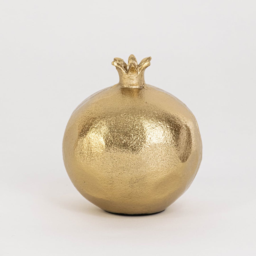 Gold pomegranate decor with crown top and detailed red seed section ideal for tabletop display or festive styling.
