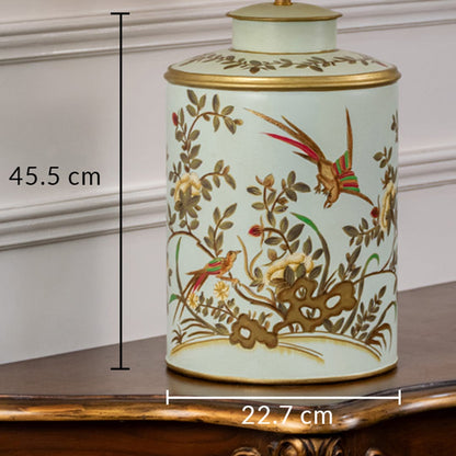 Table lamp with hand painted floral bird ceramic base shown with 45.5 cm height and 23 cm width for size reference.