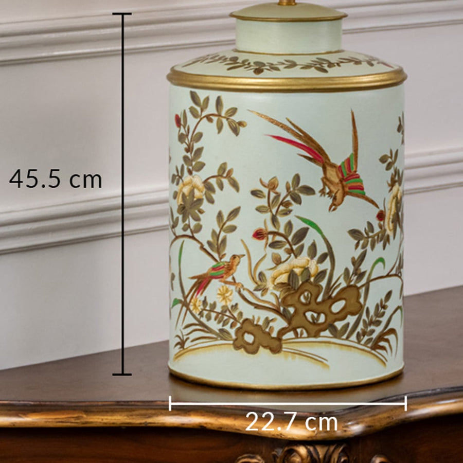 Table lamp with hand painted floral bird ceramic base shown with 45.5 cm height and 23 cm width for size reference.
