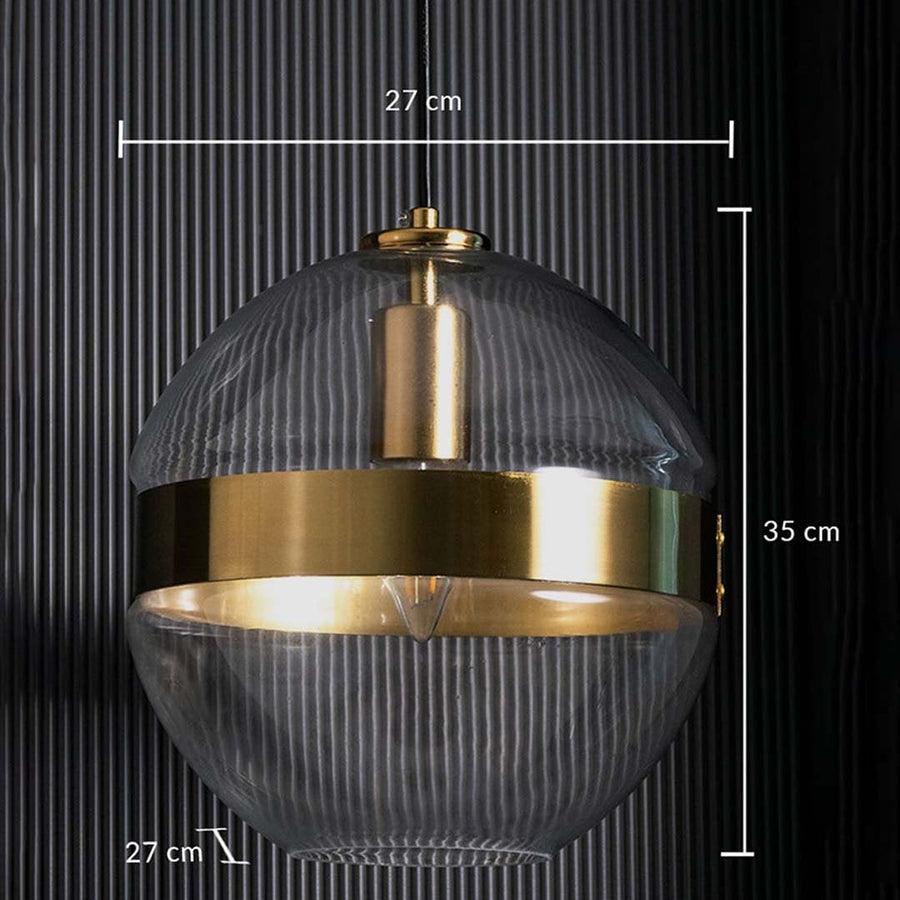 Pendant light measured at 27 cm width 35 cm height and 27 cm depth featuring a clear glass sphere with gold band displayed on a dark textured background.
