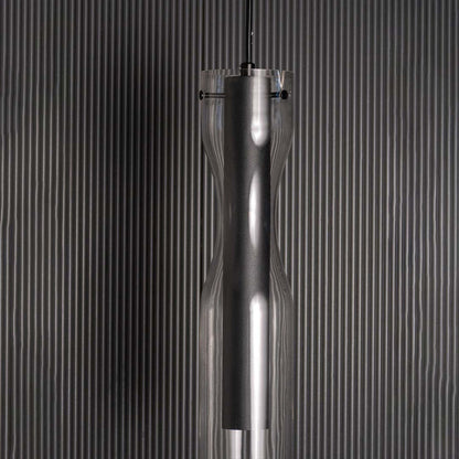 Zoomed view of the pendant light showing the smooth black inner cylinder and crystal clear outer glass layer crafted for a refined contemporary look.