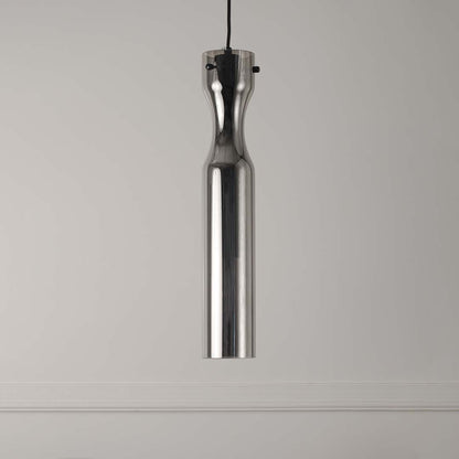 Slim brass pendant light with clear textured glass shade on white background for stylish interior lighting.