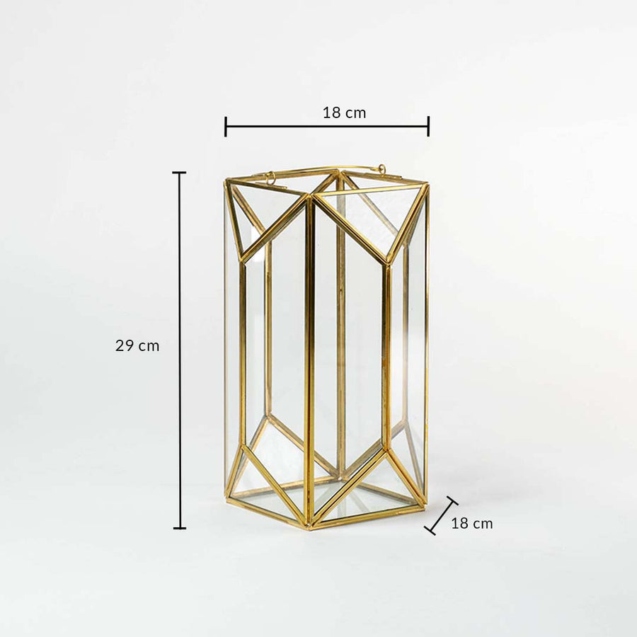 Gold metal and glass geometric candle lantern shown with dimensions 29 cm height and 18 cm width ideal for living room bedroom or hallway decor placement.