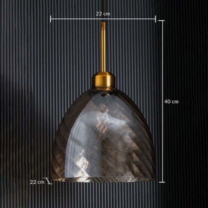 A gold and smoked glass pendant light shown with 22 cm width 22 cm depth and 40 cm height measurements highlighting its compact modern size.