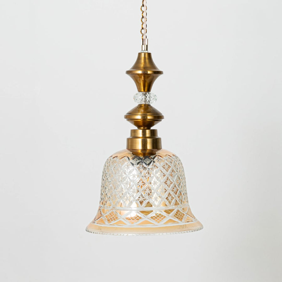 Patterned glass and gold metal pendant light designed for bedroom dining room and classic home decor.