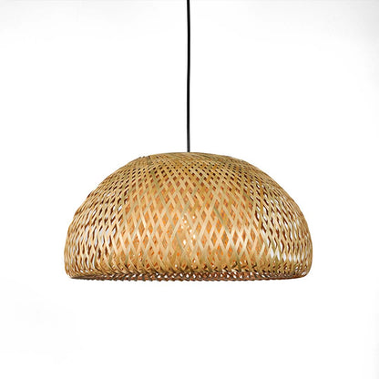 Handwoven natural rattan pendant light displayed on white background for warm bohemian interior decor style.