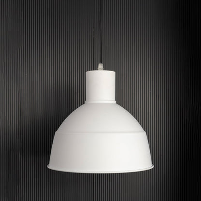 Sleek white industrial pendant light fixture turned off isolated on a pitch black background for a high contrast and dramatic presentation