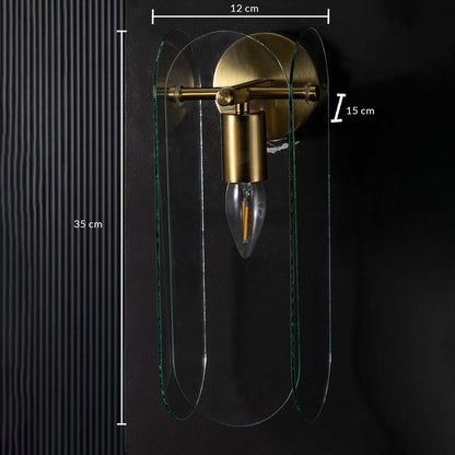 Gold and glass wall light shown with 35 cm height and 12 cm width giving accurate size details for ideal placement in modern interior spaces.
