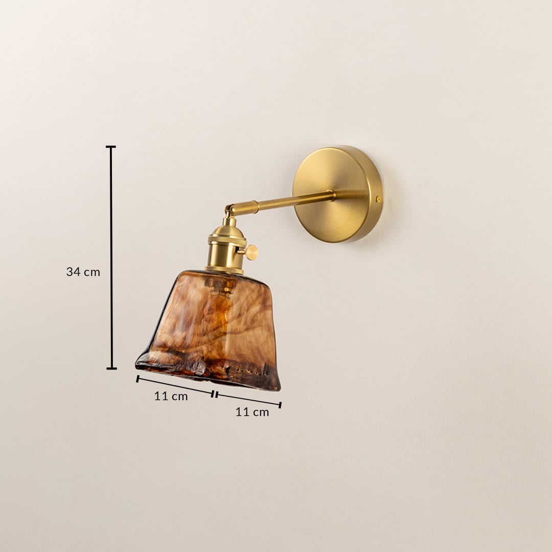 Brass wall sconce with amber glass shade dimension view 34 cm height 11 cm width for bedroom hallway and living room wall lighting.