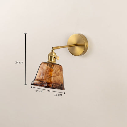 Brass wall sconce with amber glass shade dimension view 34 cm height 11 cm width for bedroom hallway and living room wall lighting.