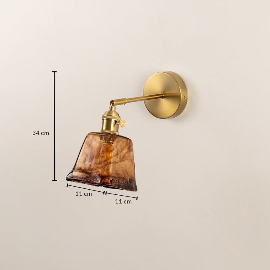 Brass wall sconce with amber glass shade dimension view 34 cm height 11 cm width for bedroom hallway and living room wall lighting.