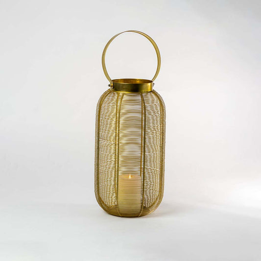 Decorative gold metal mesh lantern with candle holder for modern tabletop decor styling use.