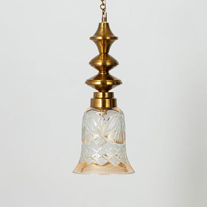 Hanging pendant light with bell-shaped etched glass and brass detailing ideal for elegant traditional interiors.