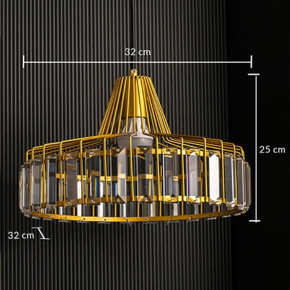 Table lamp chandelier shown with dimensions 32 cm width 25 cm height and 32 cm depth featuring a gold frame and crystal panels against a dark backdrop