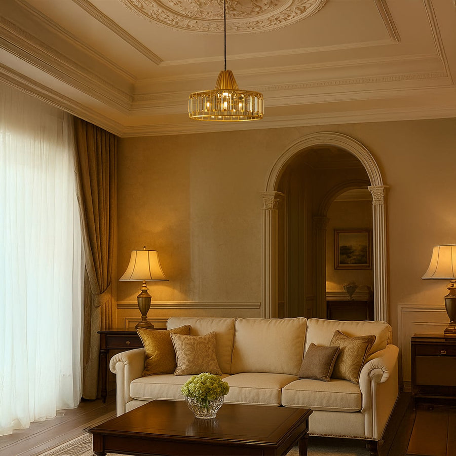 Elegant gold crystal pendant light glowing above a classic beige living room with warm decor and soft ambient lighting