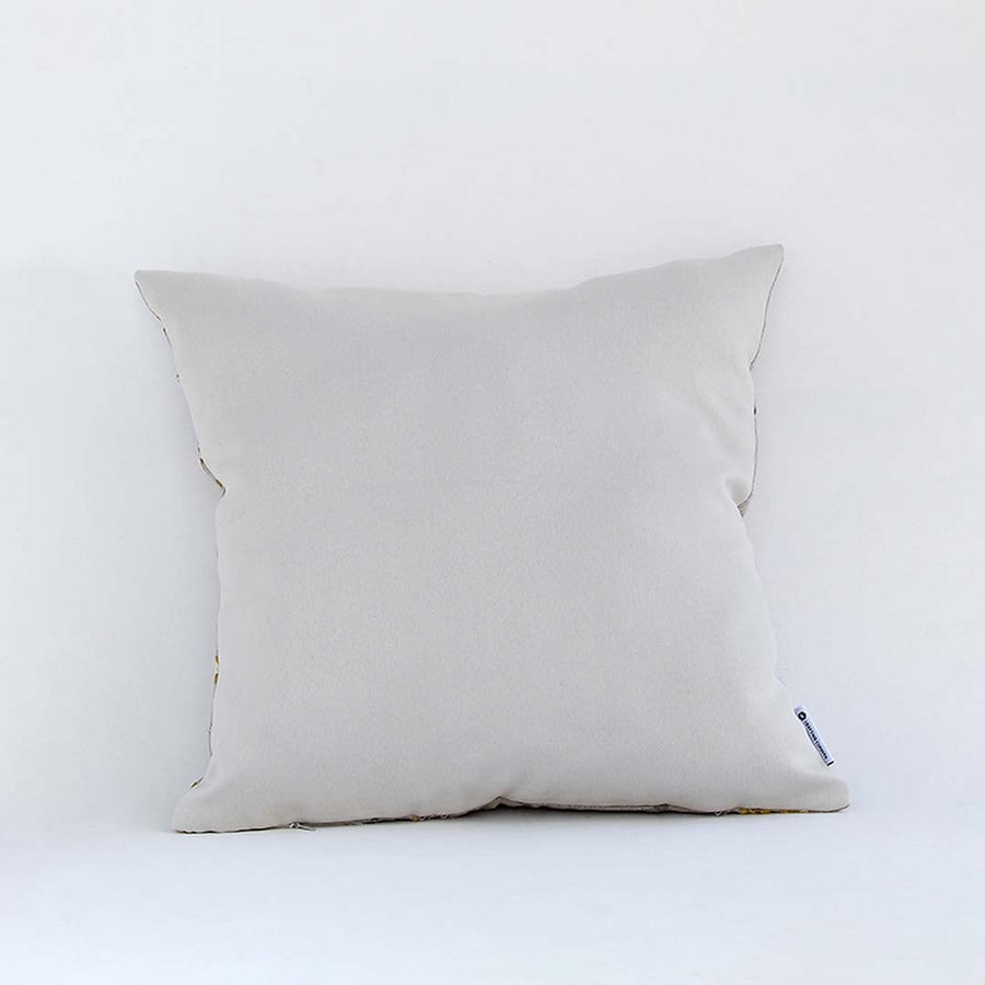 Backside of the cushion cover in beige cotton fabric shown in a smooth minimal finish offering a breathable gentle and skin friendly material ideal for sofas beds and modern interiors.