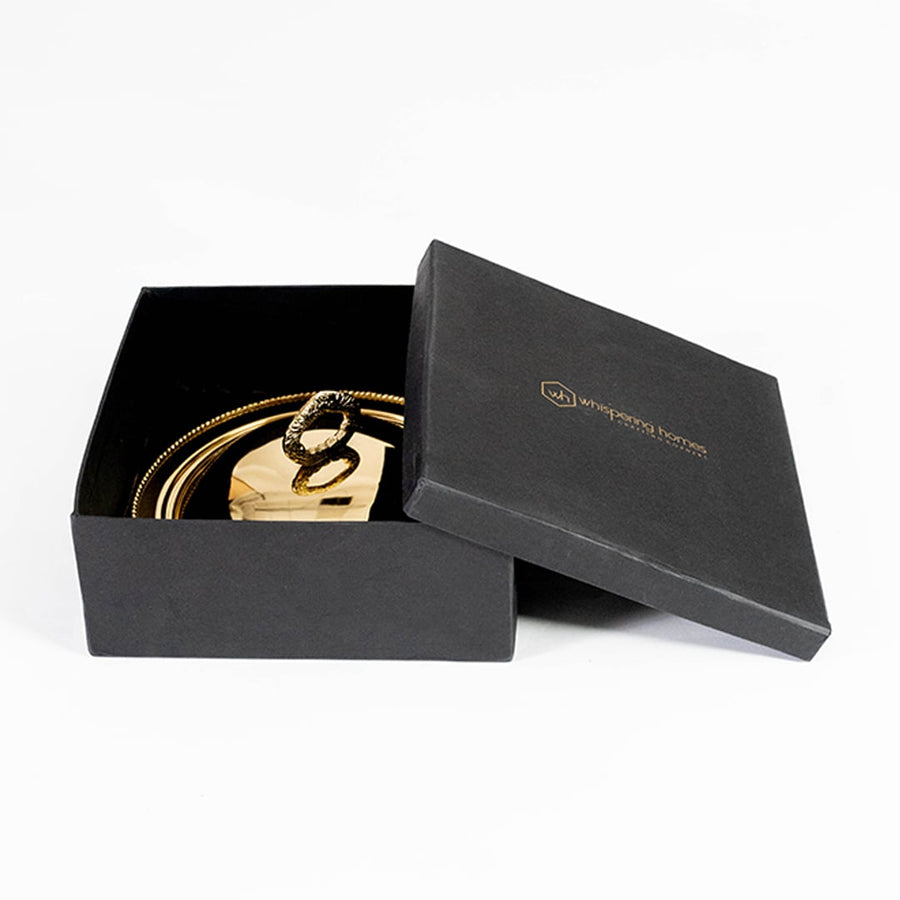 Gold dome serving platter carefully packed inside premium black box with padding for gifting and safe delivery.