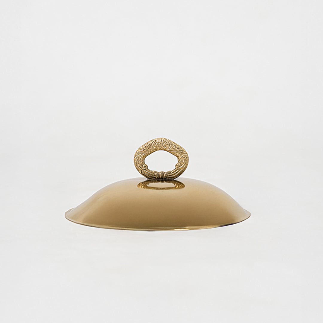 Shiny gold dome lid with ring handle displayed separately showing smooth finish and elegant domed shape.