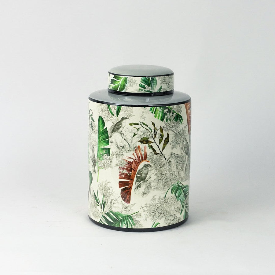 Tropical bird jar displayed on a white background showcasing detailed bird and leaf artwork.