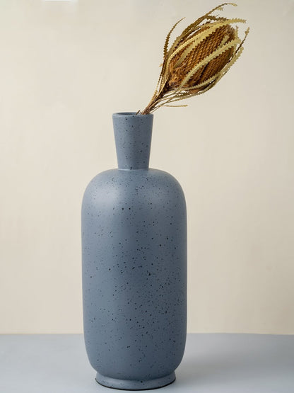 Tall grey ceramic vase with matte speckled texture modern decorative accent for stylish home interior.
