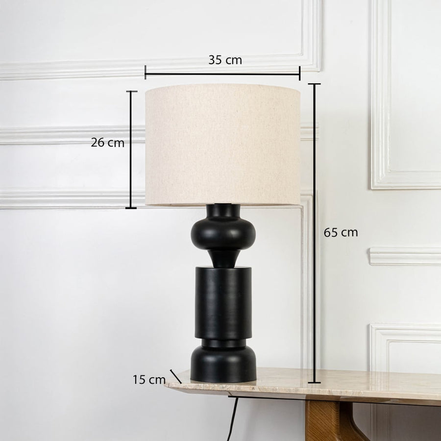 Green ceramic table lamp with beige shade shown with height and width measurements for accurate size guide.