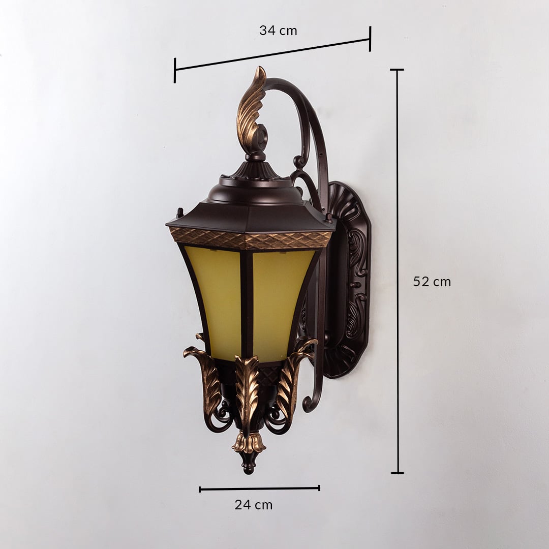 Outdoor wall light in vintage lantern design shown on white background with 52 cm height 34 cm width and 24 cm depth.