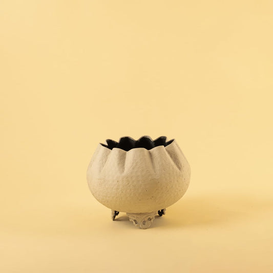 Cream metal scalloped bowl planter decor on a clean white background highlighting its textured elegant finish for home styling.