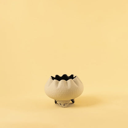 Cream metal scalloped bowl planter decor on a clean white background highlighting its textured elegant finish for home styling.