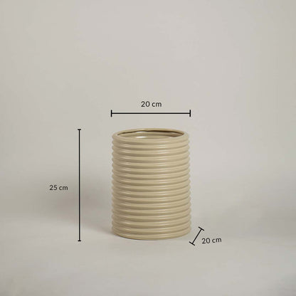 Beige ribbed ceramic vase measuring 25 cm height and 20 cm width shown on white background for size reference.