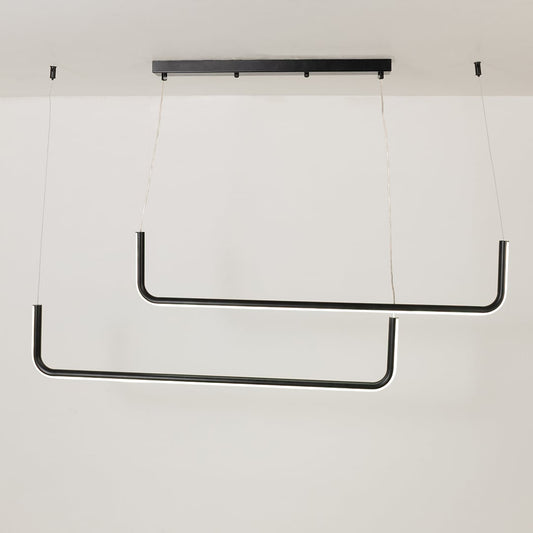 Modern black hanging light glowing softly on a bright white background showing a sleek dual bar design for stylish interiors.