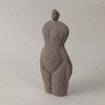 Side angle view of grey ceramic torso sculpture vase with unique handcrafted texture styled for modern home and office decor.
