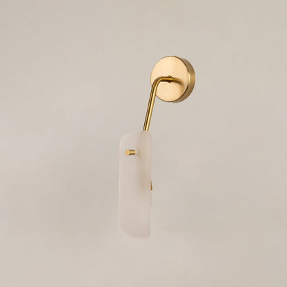 Gold wall light with frosted glass shade displayed on a bright white background with lights off for a minimal modern look.