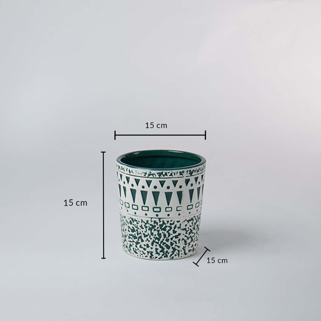 A ceramic planter with teal patterned detailing shown with measurements of 15 cm height and 15 cm width to highlight its compact decorative size.