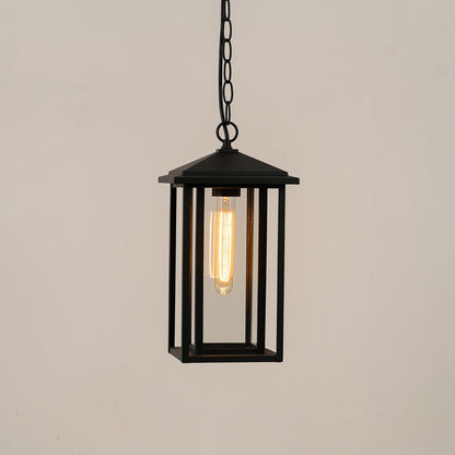 A sleek black hanging lantern displayed on a white background showing its clean modern frame and clear glass panels with lights on for a clear product-only view.