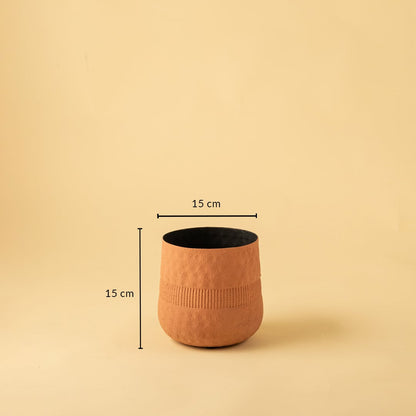Small terracotta textured pot with black interior shown with 15 cm width and 15 cm height for modern decorative home styling.