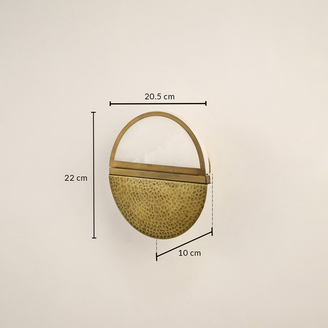 Gold metal wall light with 22 cm height 20.5 cm width and 10 cm depth for modern decor styling spaces.