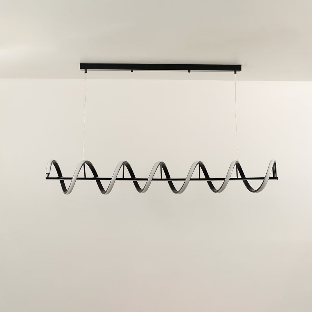 Black metal wave LED pendant light with integrated illumination designed for stylish modern ceiling lighting interiors.