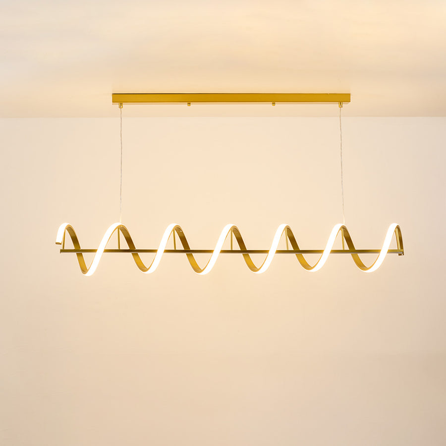 Gold metal wave LED pendant light with integrated illumination creating elegant modern ambient ceiling lighting indoors.
