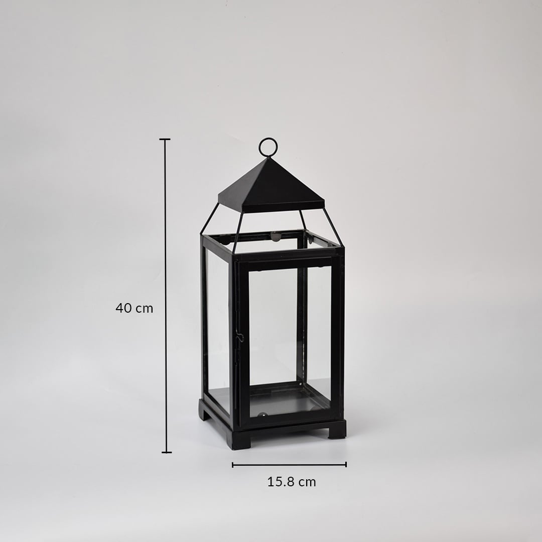 Black metal lantern showing 42 cm height 18 cm width and 18 cm depth dimensions suitable for floor tabletop or porch decor placement.