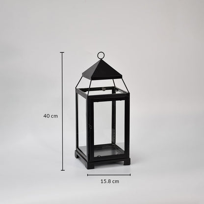 Black metal lantern showing 42 cm height 18 cm width and 18 cm depth dimensions suitable for floor tabletop or porch decor placement.