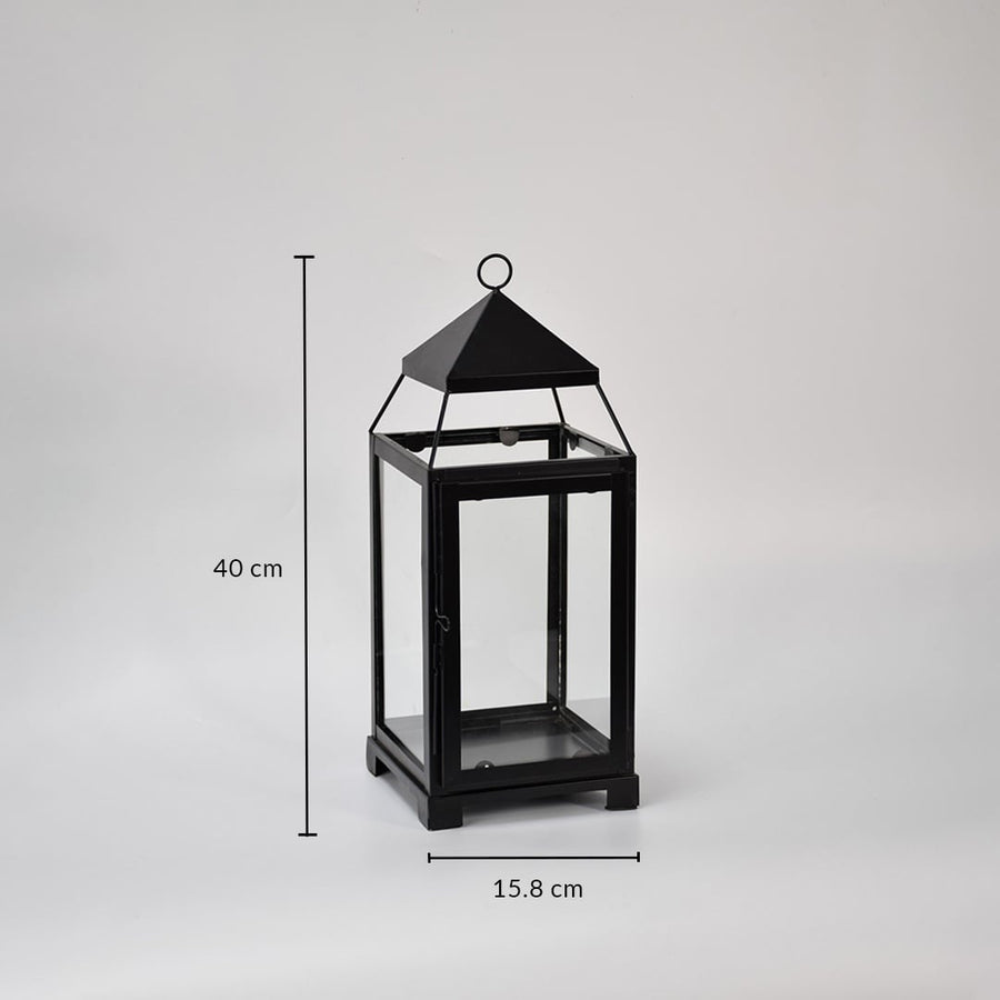 Black metal lantern showing 42 cm height 18 cm width and 18 cm depth dimensions suitable for floor tabletop or porch decor placement.