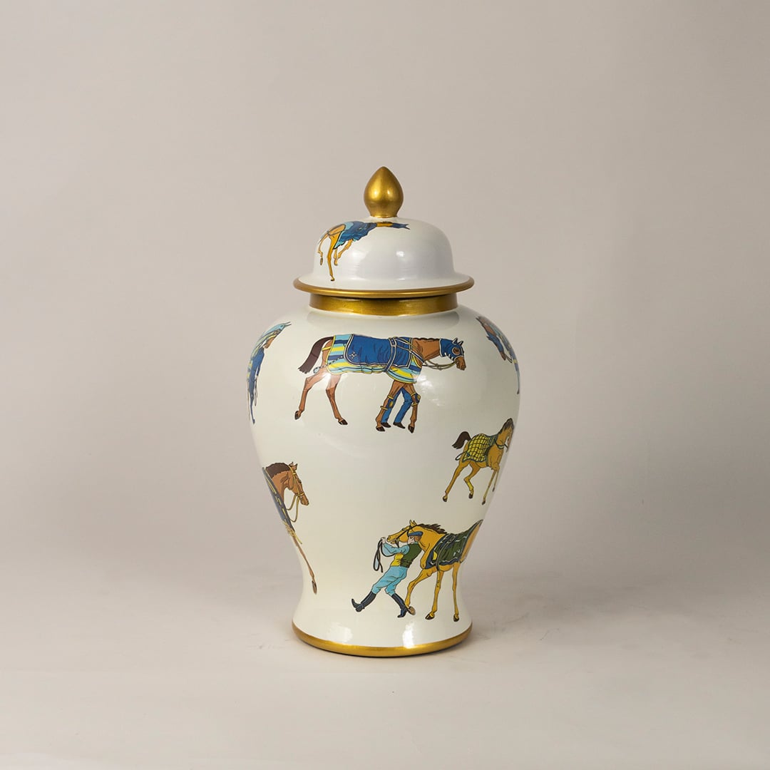Side profile of white ceramic jar featuring hand-painted horse artwork and gold accents for artistic home decor.