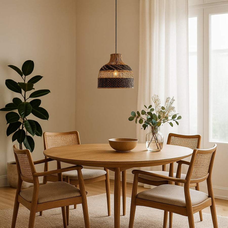 Black and natural rattan pendant light adding an earthy modern touch and soft glow to cozy living spaces.