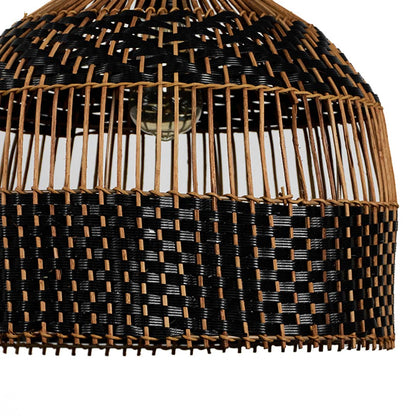 Closeup of rattan pendant light showing detailed craftsmanship with black and brown interwoven pattern.