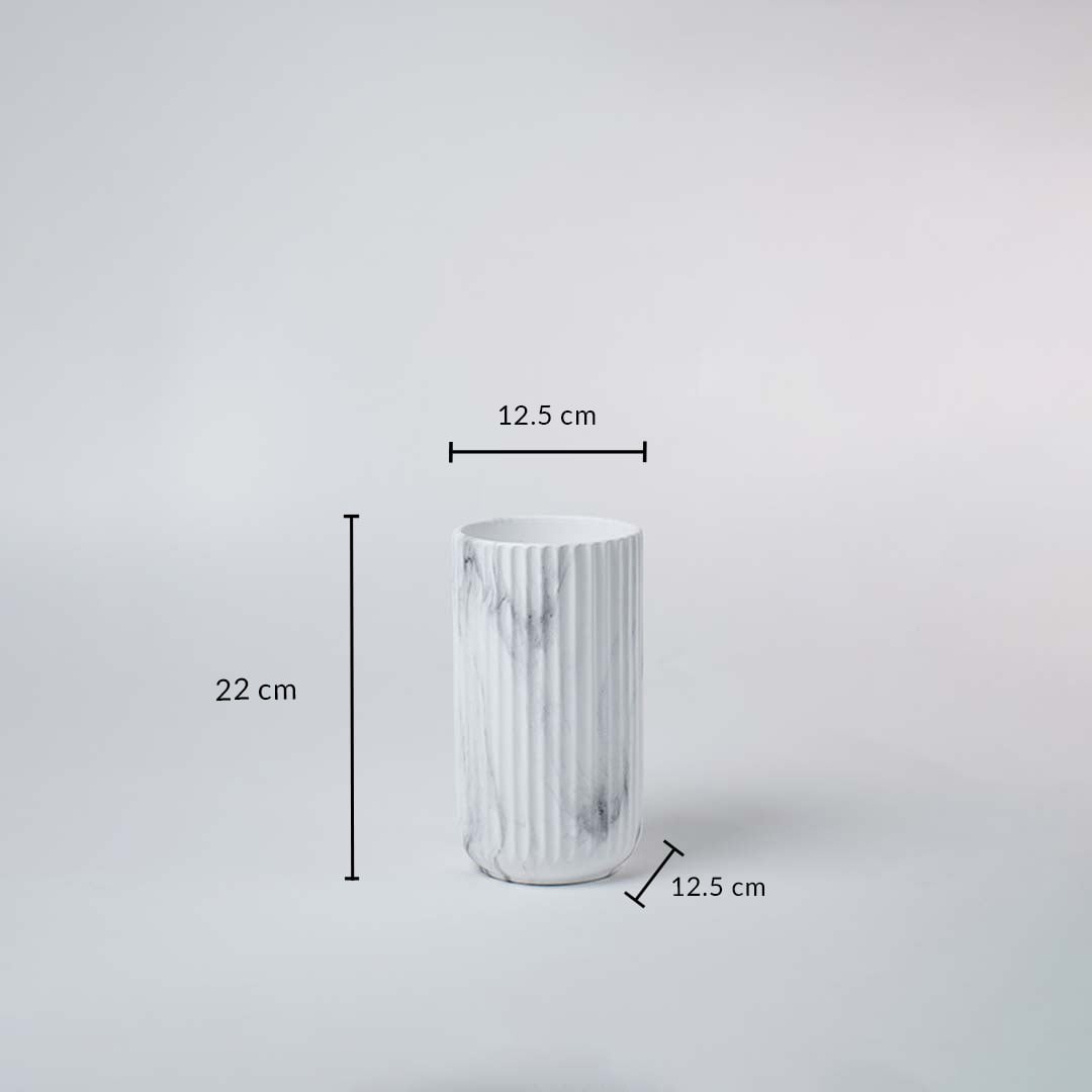 White ribbed ceramic vase with marble accents shown with dimensions 22 cm height and 12.5 cm width on a plain white background.
