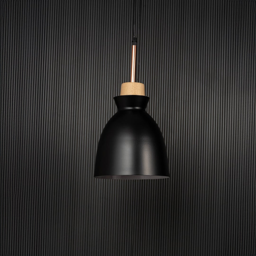 Black pendant ceiling light with wooden accent switched off on back background for modern dining room and cafe lighting decor.