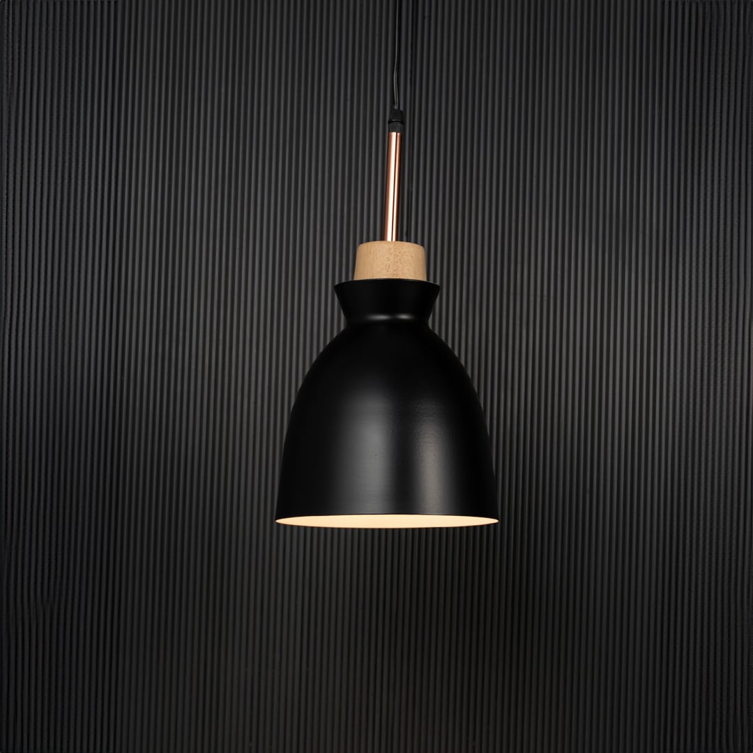 Black pendant ceiling light with wooden accent illuminated on back background for elegant dining room and cafe ceiling decor.