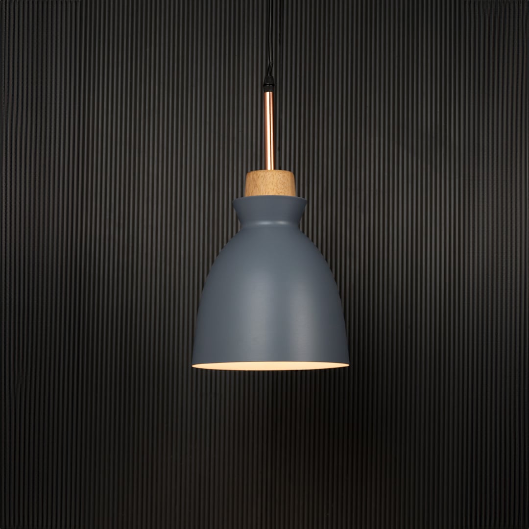 Grey pendant ceiling light with wooden accent illuminated on back background for elegant dining room and cafe ceiling lighting.