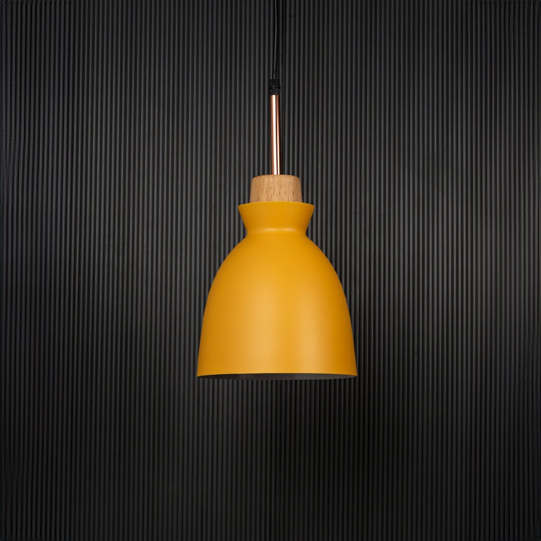 Yellow pendant ceiling light with wood top switched off on back background for modern dining room cafe and kitchen lighting decor.