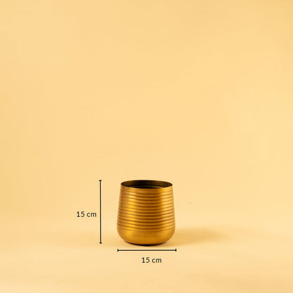Gold metal planter decor with 15 cm height and 15 cm width ideal for shelves tables and modern home styling.